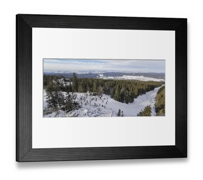 Framed Print : Winter landscape with snow-covered forest and people skiing Framed Print : Winter landscape with snow-covered forest and people skiing