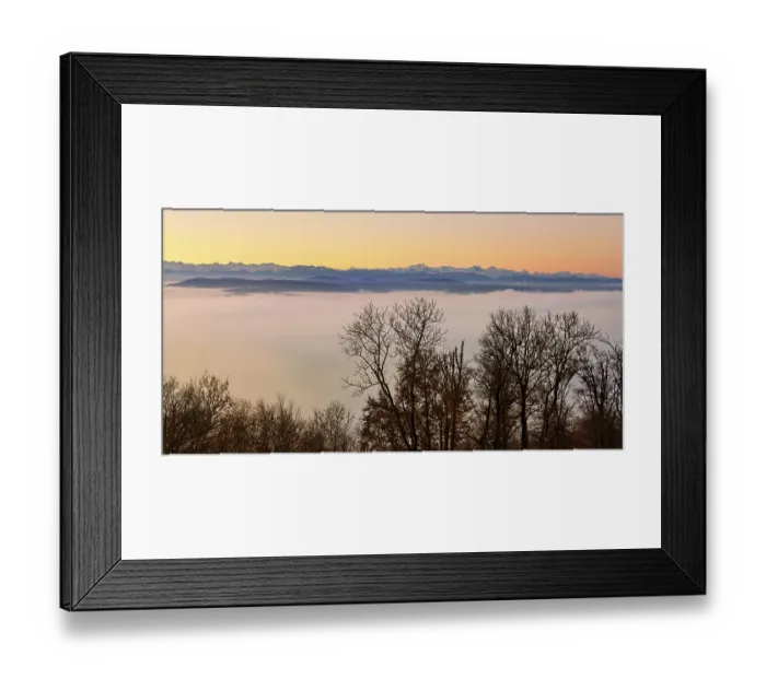 Framed Print : Snowy Alps over a sea of fog in morning light