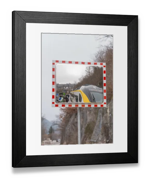 Framed Print : A train in the mirror on a railroad track in a mountainous area Framed Print : A train in the mirror on a railroad track in a mountainous area