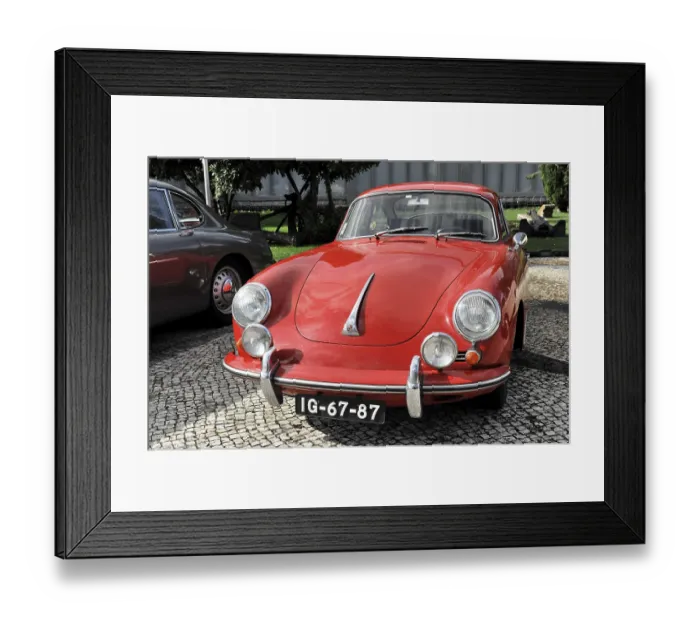 Framed Print : Red Porsche classic car seen from the front on a cobblestone Framed Print : Red Porsche classic car seen from the front on a cobblestone