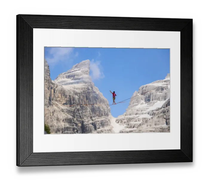 Framed Print : Slackliner in the mountains, mountain peaks of the Brenta Mountains Framed Print : Slackliner in the mountains, mountain peaks of the Brenta Mountains