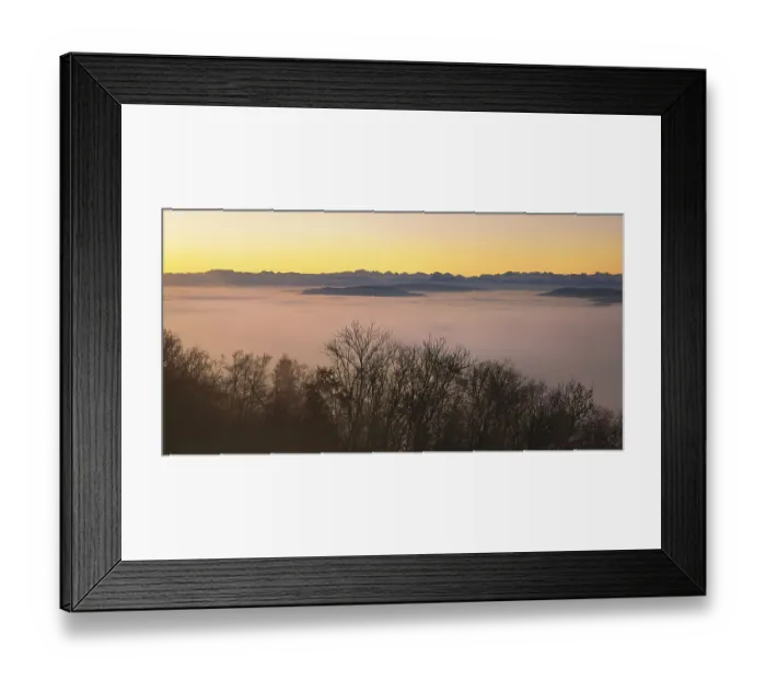 Framed Print : Snowy Alps over a sea of fog in morning light Framed Print : Snowy Alps over a sea of fog in morning light