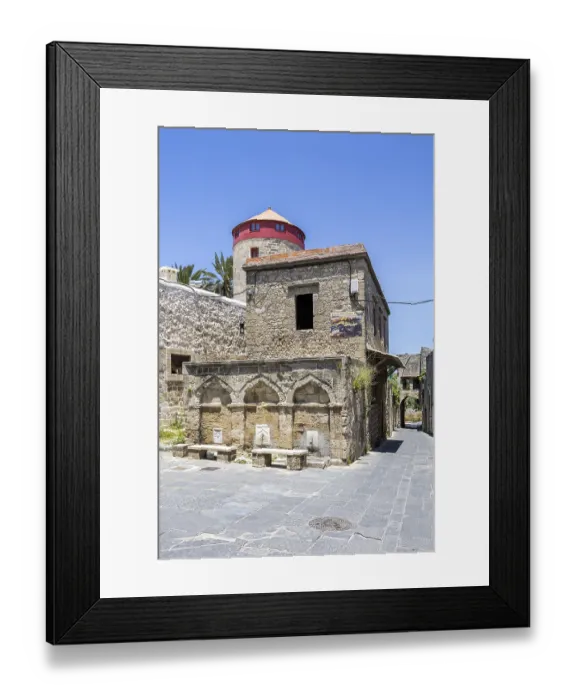Framed Print : Ottoman fountain and windmill in the historic old town from the Middle Ages on the island of Rhodes Framed Print : Ottoman fountain and windmill in the historic old town from the Middle Ages on the island of Rhodes