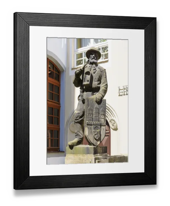 Framed Print : Bergmannsdenkmal, sandstone figure of a miner with coat of arms
