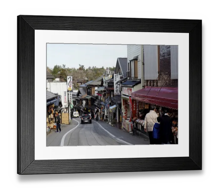 Framed Print : Busy street with traditional shops and pedestrians