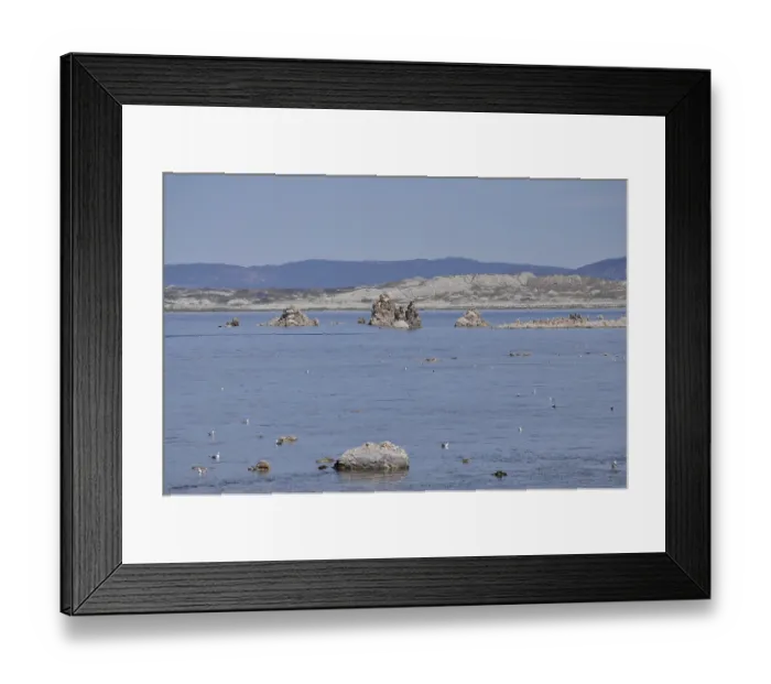 Framed Print : A still lake, Lake Natron, with rocks
