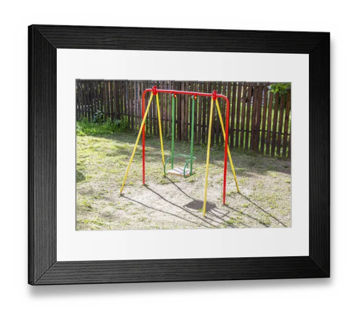 Framed Print : Children's metal swing for play and rest in summer Framed Print : Children's metal swing for play and rest in summer