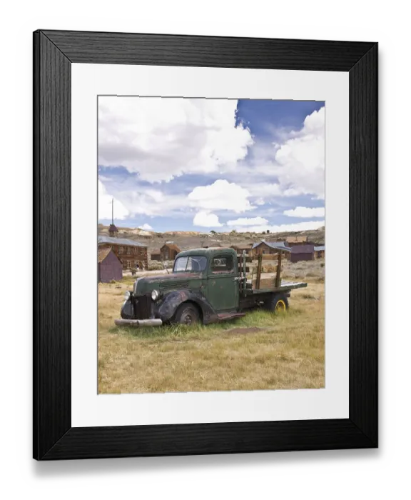 Framed Print : An old vintage truck rests where it died in a California goldrush ghost town
