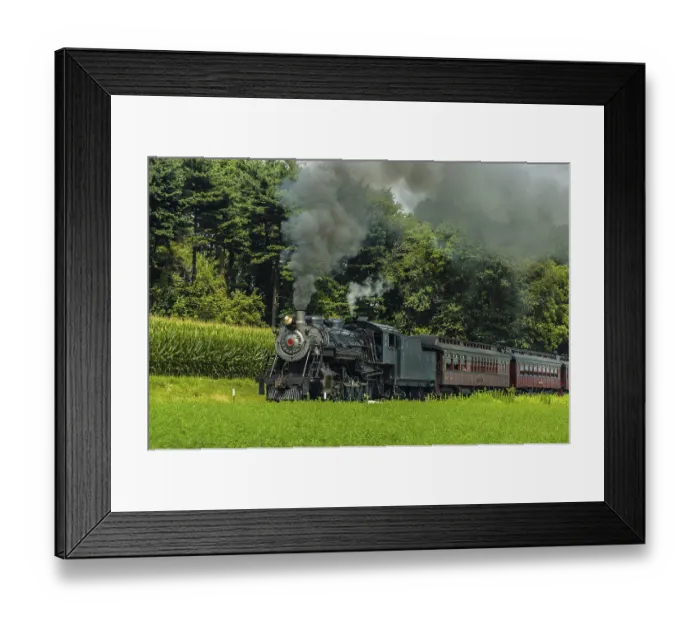 Framed Print : Vintage Steam Locomotive Engine with Antique Passenger Train Puffing Black Smoke in the Country Side