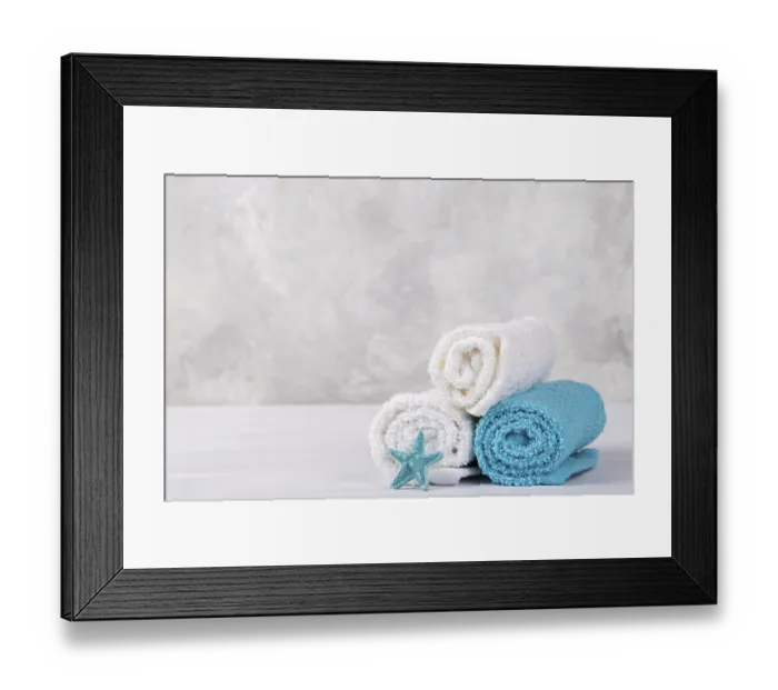 Framed Print : Spa composition with white and blue soft rolled cotton towels and star fish copy space Framed Print : Spa composition with white and blue soft rolled cotton towels and star fish copy space