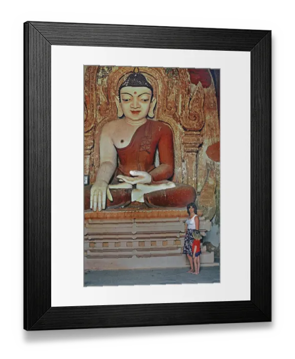 Framed Print : Buddha figure with tourist and child in Htilominlo Temple Framed Print : Buddha figure with tourist and child in Htilominlo Temple