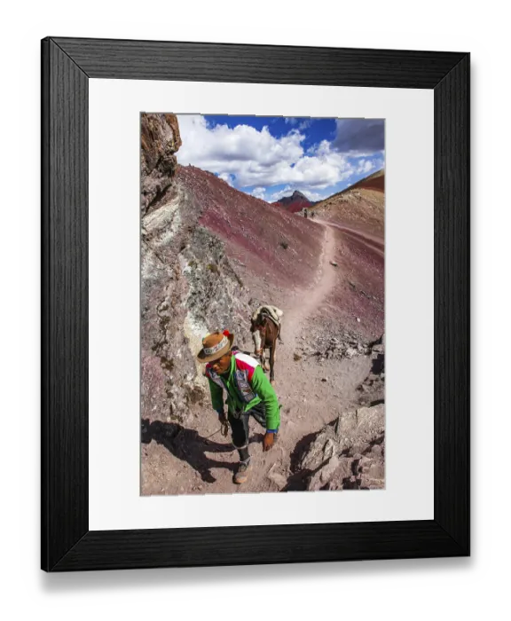Framed Print : Indigenous guide with packhorse in the rainbow mountains