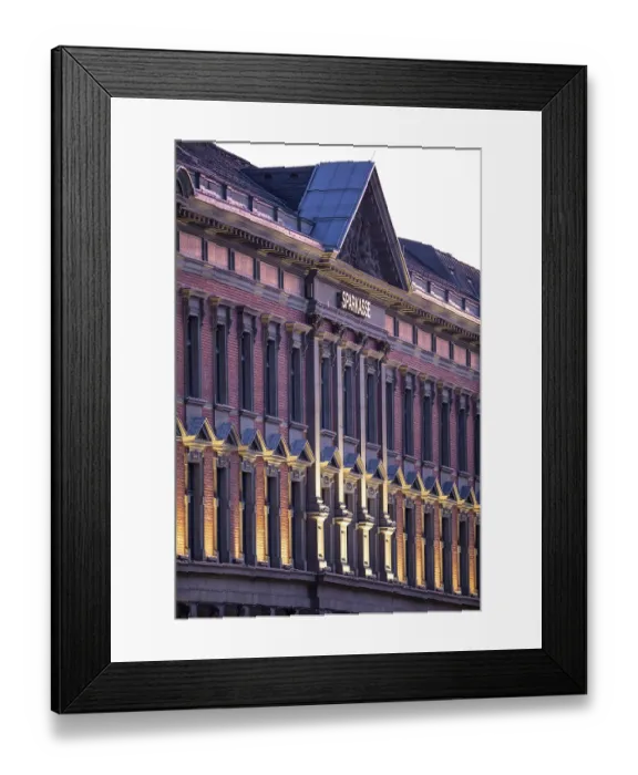 Framed Print : Historic building with brick facade and classic architecture in sunlight