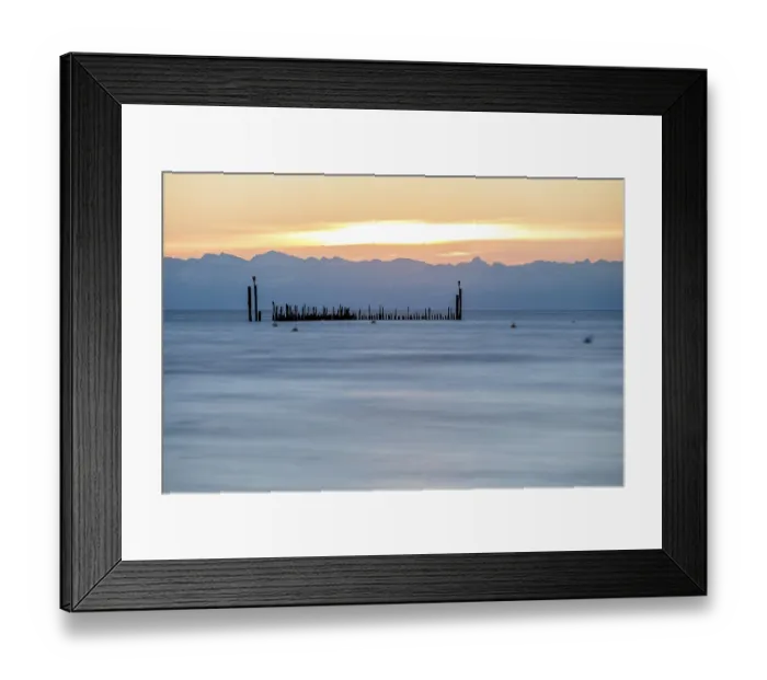 Framed Print : Soft reflections on the lake at sunrise with mountain panorama