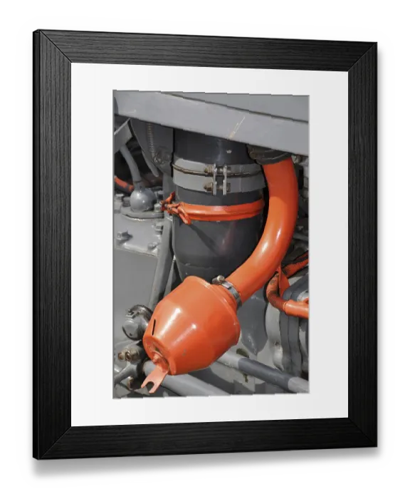 Framed Print : Part of a classic car