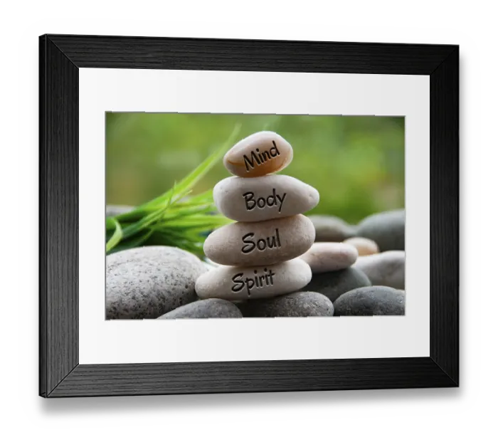 Framed Print : Mind, Body, Soul and Spirit words engraved on zen stones with blurred nature background