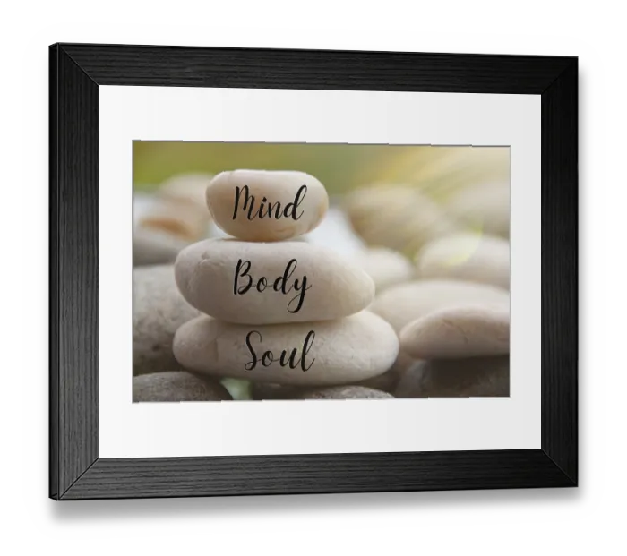 Framed Print : Light shining on zen stones with words Mind