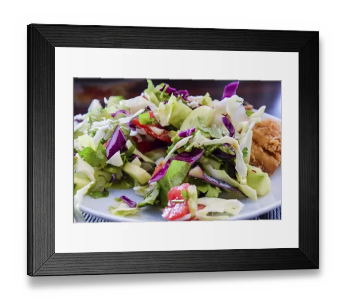 Framed Print : A assorted salad with cucumbers and purple leaflets