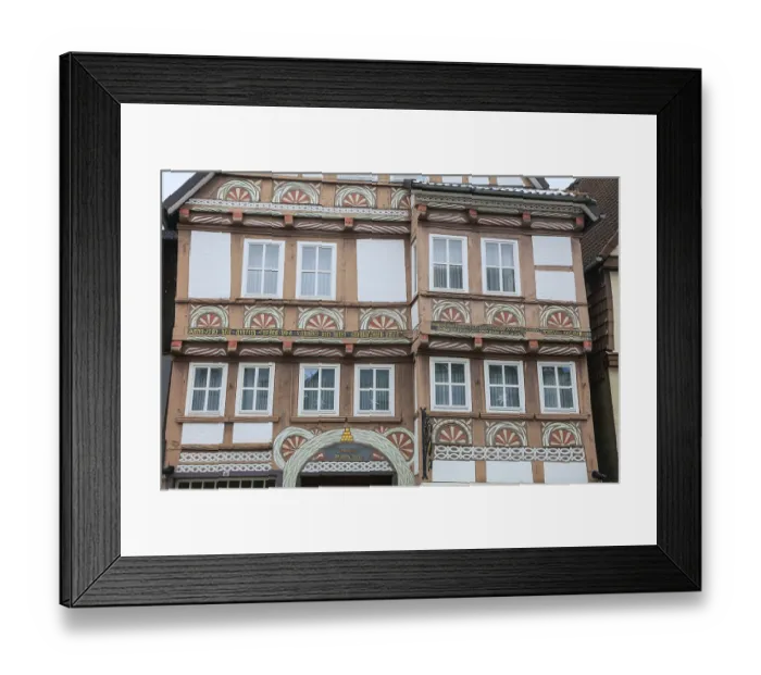 Framed Print : Colourfully painted half-timbered house from the 16th century in NiedernstraBe Framed Print : Colourfully painted half-timbered house from the 16th century in NiedernstraBe