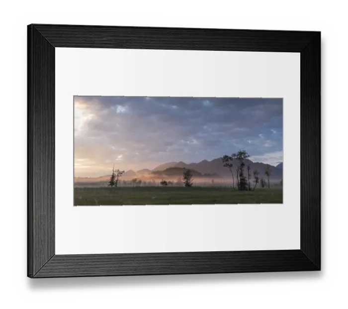 Framed Print : Misty sunrise scene with distant mountains Framed Print : Misty sunrise scene with distant mountains
