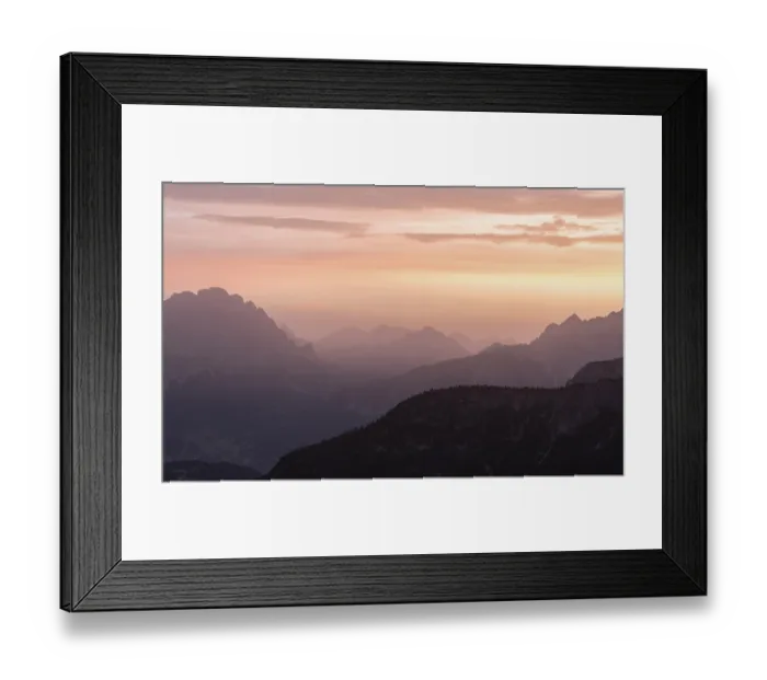 Framed Print : Mountain silhouettes during a pink and orange sunset Framed Print : Mountain silhouettes during a pink and orange sunset