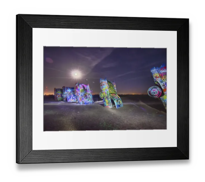 Framed Print : AMARILLO, TEXAS - April 2015: Famous art installation Cadillac Ranch at night