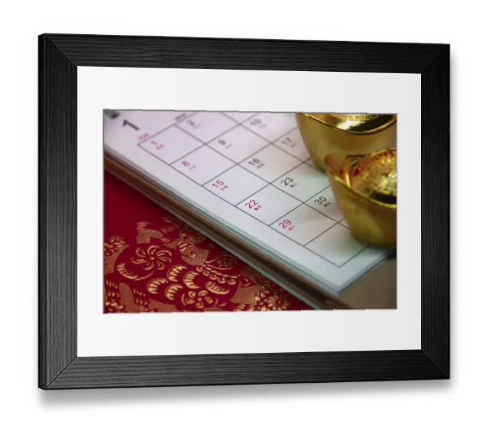 Framed Print : Side view of January 2023 calendar with red golden background Framed Print : Side view of January 2023 calendar with red golden background