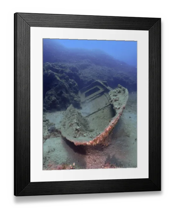 Framed Print : An old shipwreck is lying on the ocean floor