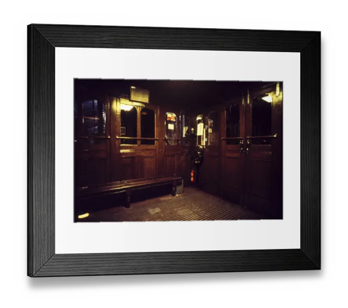 Framed Print : Historic Santa Justa elevator between houses at night