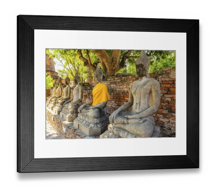 Framed Print : Stone Buddha statues, historic Buddhist temple complex