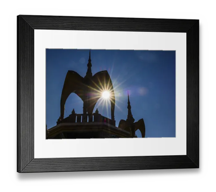 Framed Print : The sun shines through a round arch pavilion