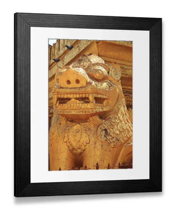 Framed Print : Detail of a golden guardian statue in front of Shwezigon Pagoda in Nyaung-U