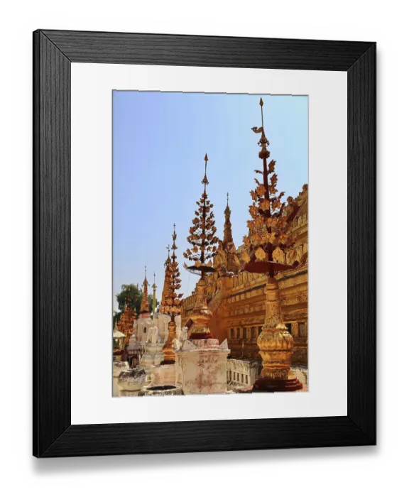 Framed Print : Detailed golden decorations of the temple under a clear sky in Nyaung-U