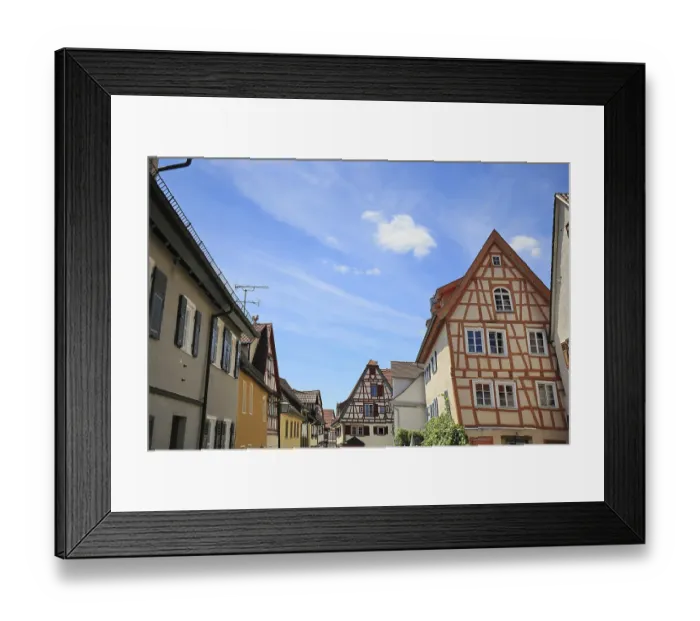 Framed Print : Charming half-timbered houses in a quiet street Framed Print : Charming half-timbered houses in a quiet street