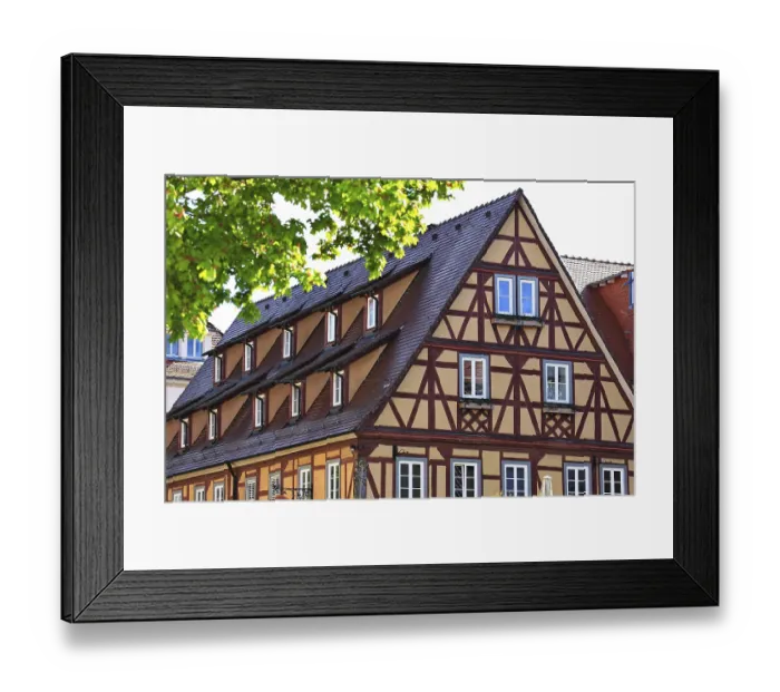 Framed Print : Historic half-timbered house with distinctive wooden architecture in Bad Mergentheim