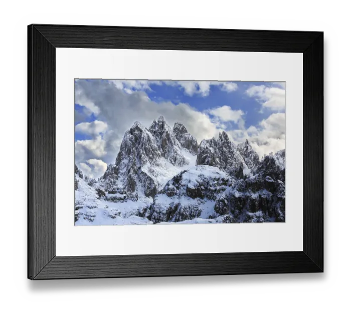 Framed Print : The impressive, snowy peaks of the Three Peaks under a blue sky in the Dolomites Framed Print : The impressive, snowy peaks of the Three Peaks under a blue sky in the Dolomites