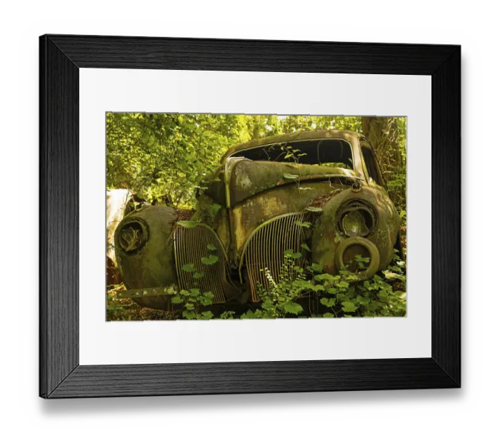 Framed Print : Old abanoded car in a forest