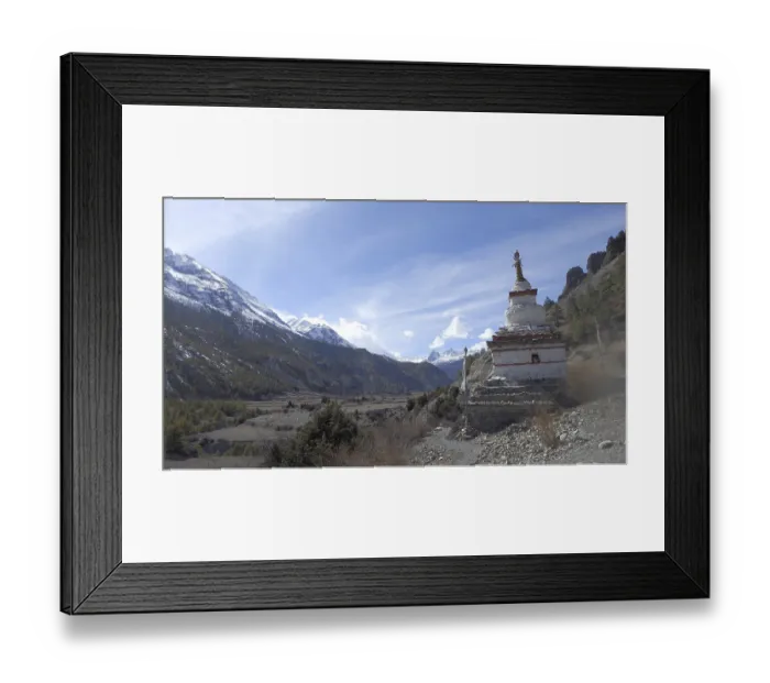 Framed Print : White stupa in front of a majestic mountain landscape with clear skies Framed Print : White stupa in front of a majestic mountain landscape with clear skies