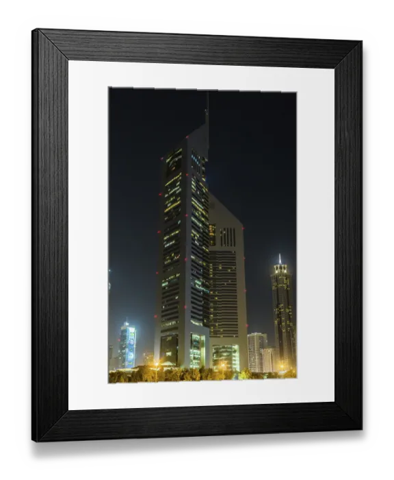 Framed Print : DUBAI - APRIL 18: Emirates Towers and Burj Khalifa at night time Framed Print : DUBAI - APRIL 18: Emirates Towers and Burj Khalifa at night time
