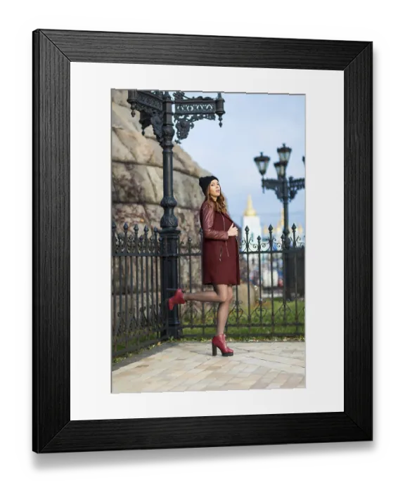Framed Print : Portrait of a young woman in a city park Framed Print : Portrait of a young woman in a city park