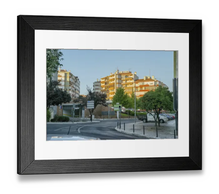 Framed Print : Romantic Lisbon street with the typical old buildings and new buildings