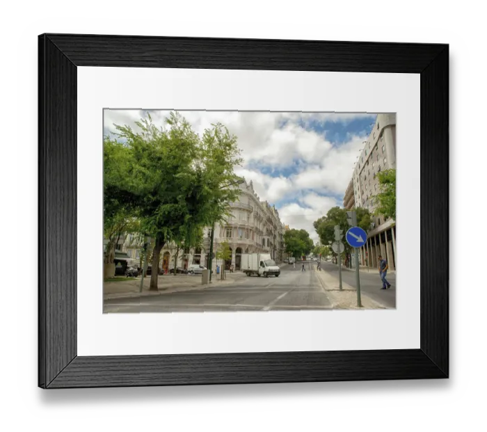 Framed Print : Romantic Lisbon street with the typical old buildings and new buildings