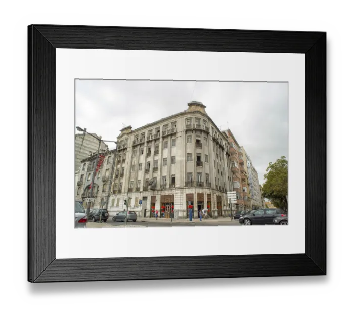 Framed Print : Romantic Lisbon street with the typical old buildings and new buildings