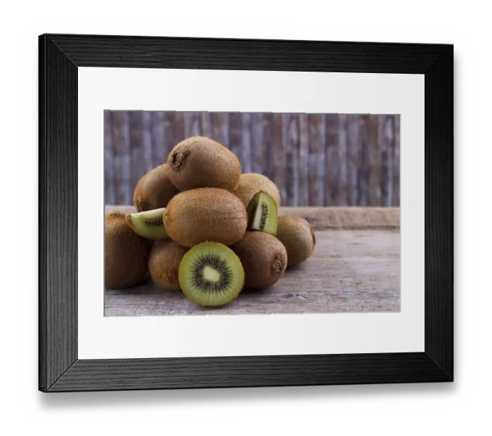 Framed Print : Pile of fresh kiwi on an old wooden board Framed Print : Pile of fresh kiwi on an old wooden board