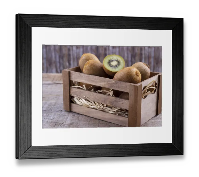 Framed Print : Box of fresh kiwi in on wooden background Framed Print : Box of fresh kiwi in on wooden background