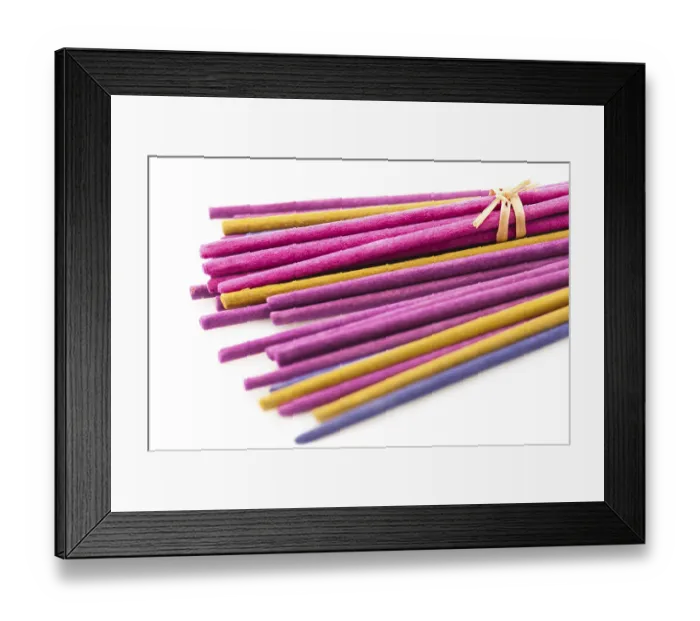 Framed Print : Macro of aroma incense sticks over white