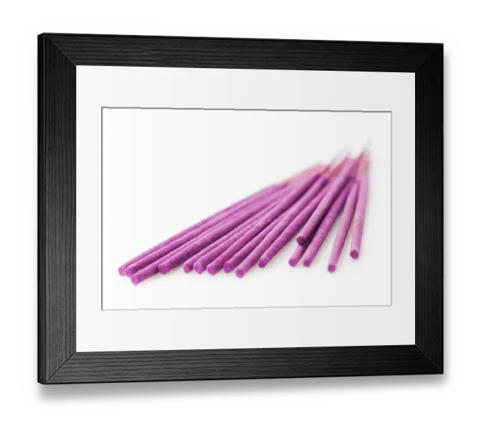 Framed Print : Macro of aroma incense sticks over white
