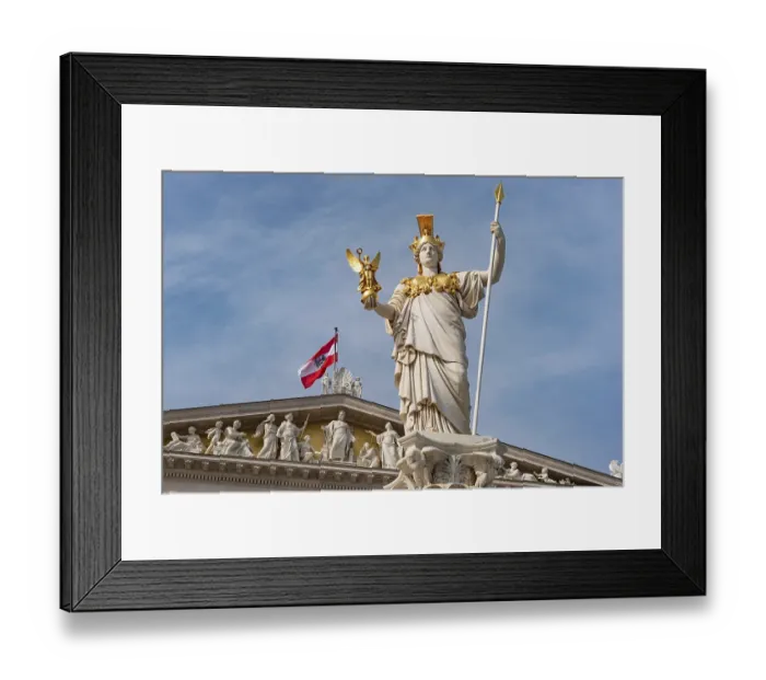 Framed Print : Vienna, Austria. October 5th 2023 Carved figures on the roof of the Parliament Building