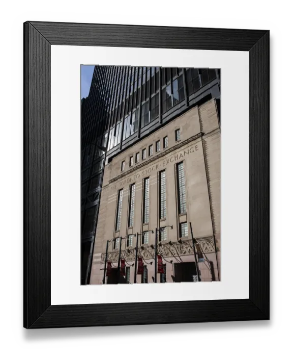 Framed Print : The facade of the Toronto Stock Exchange in sunlight highlighting its architectural details in Toronto