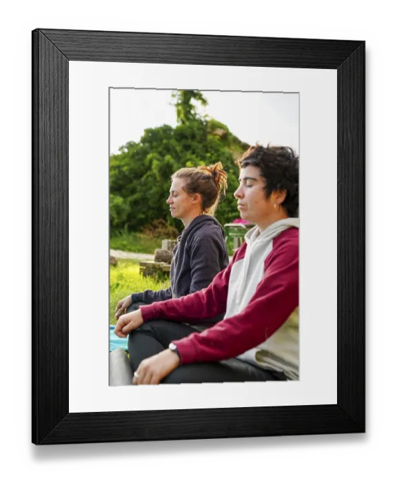 Framed Print : Lesbian couple meditates peacefully outdoors while camping in a motorhome Serene moment showcasing relaxation